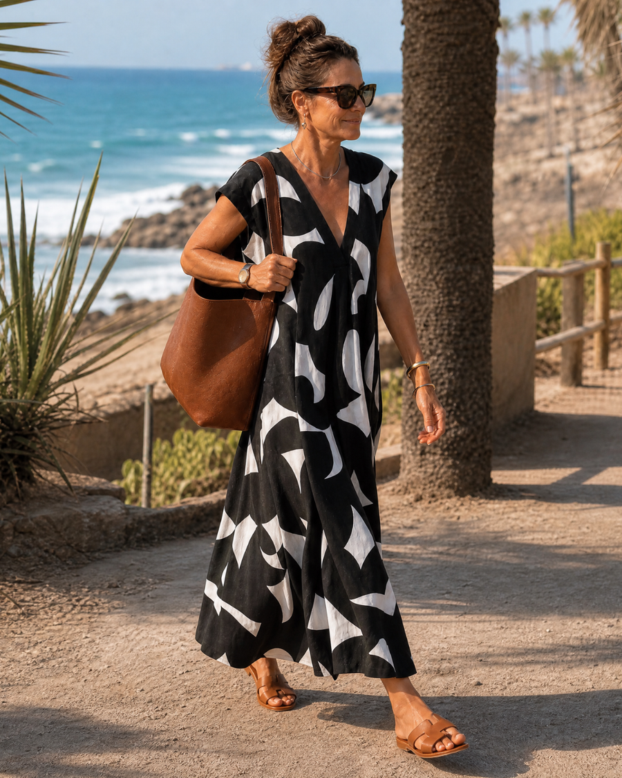Dominika | Splývavé midi šaty s abstraktním vzorem a výstřihem do V